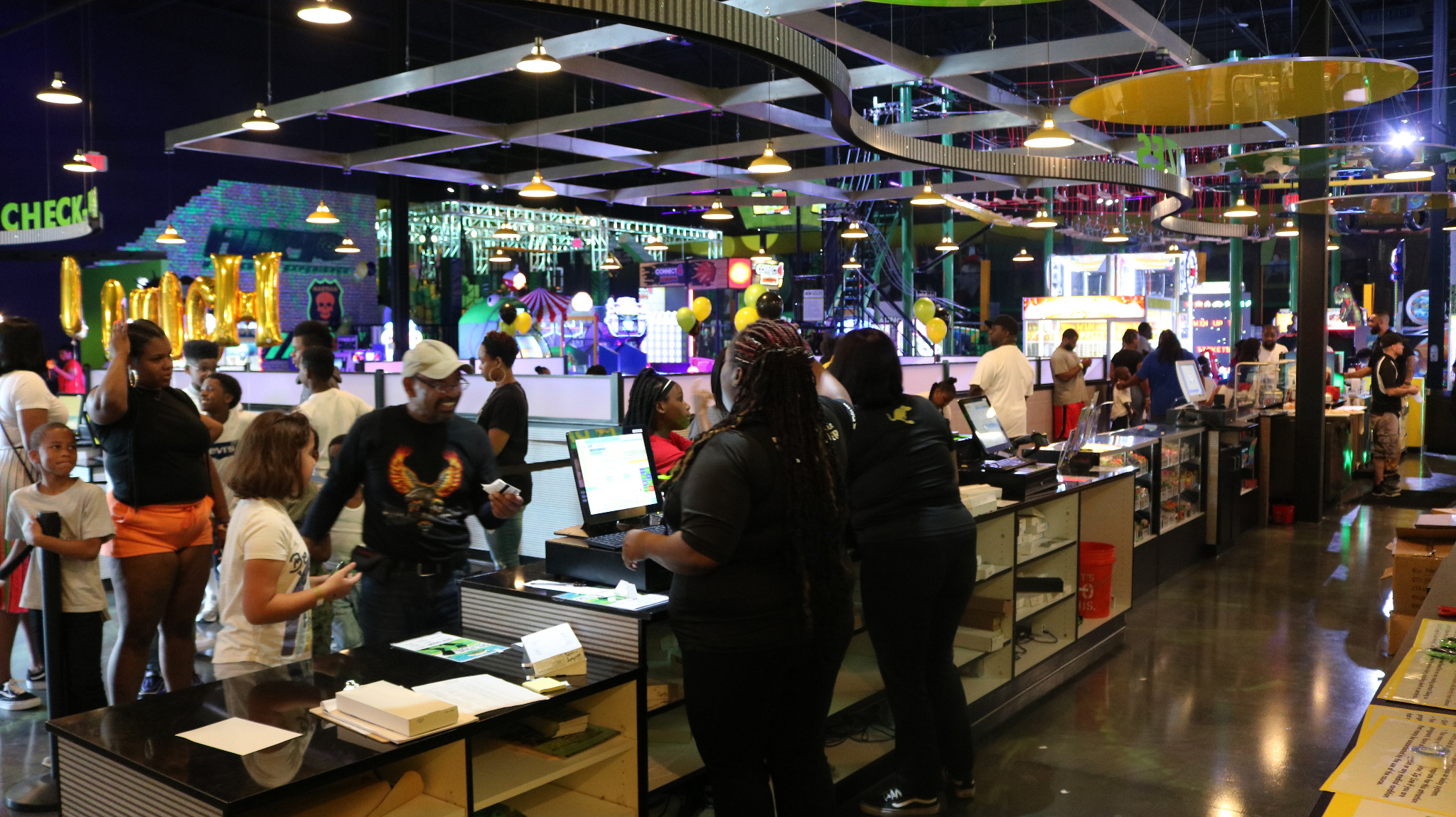 Busy Launch check-in area with guests and front end team